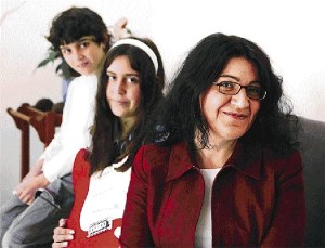 Press photo for Ashley's Guitar. That red-and-white thing is a guitar, by the way!